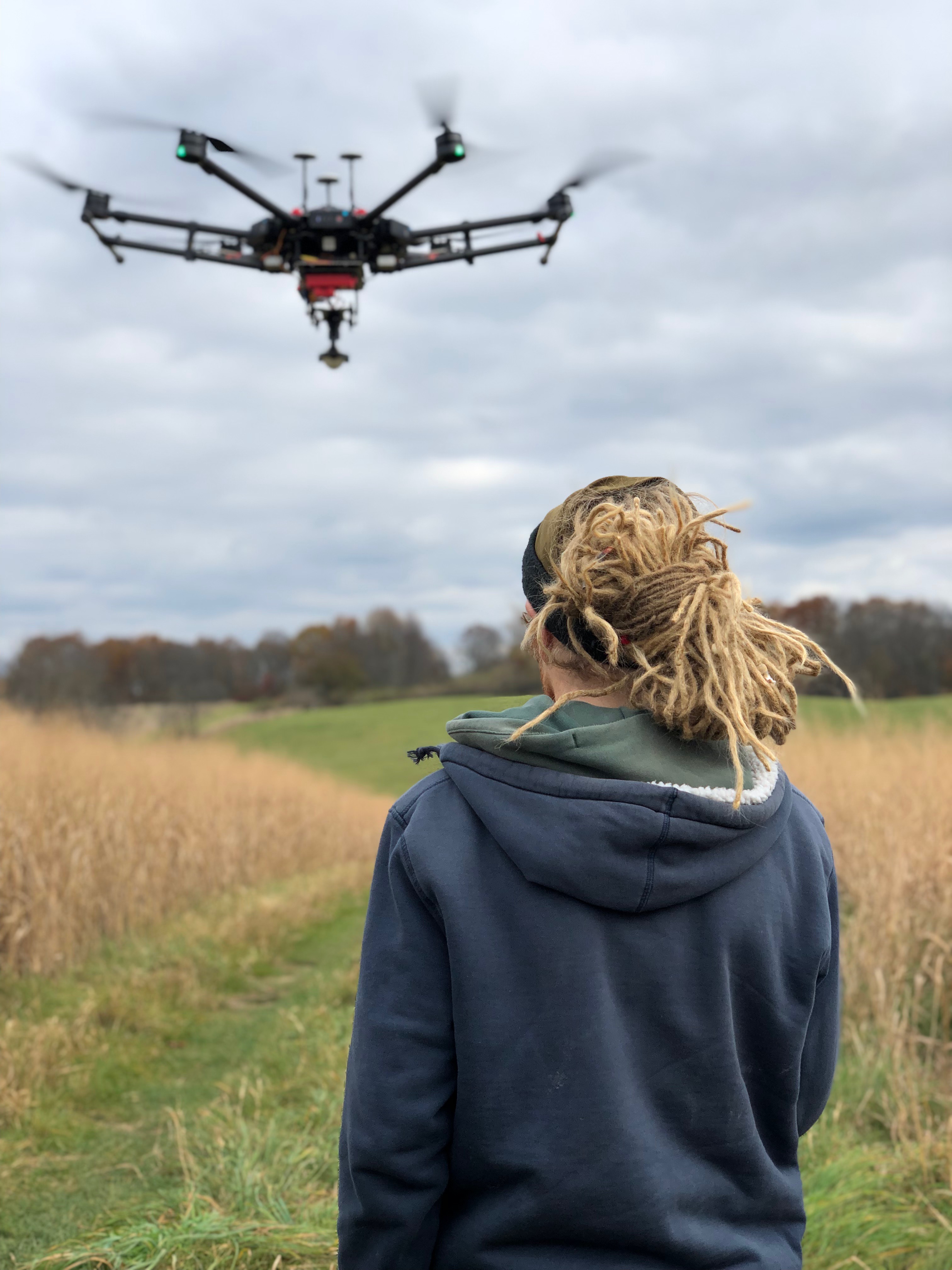 Drone flyer over operator.