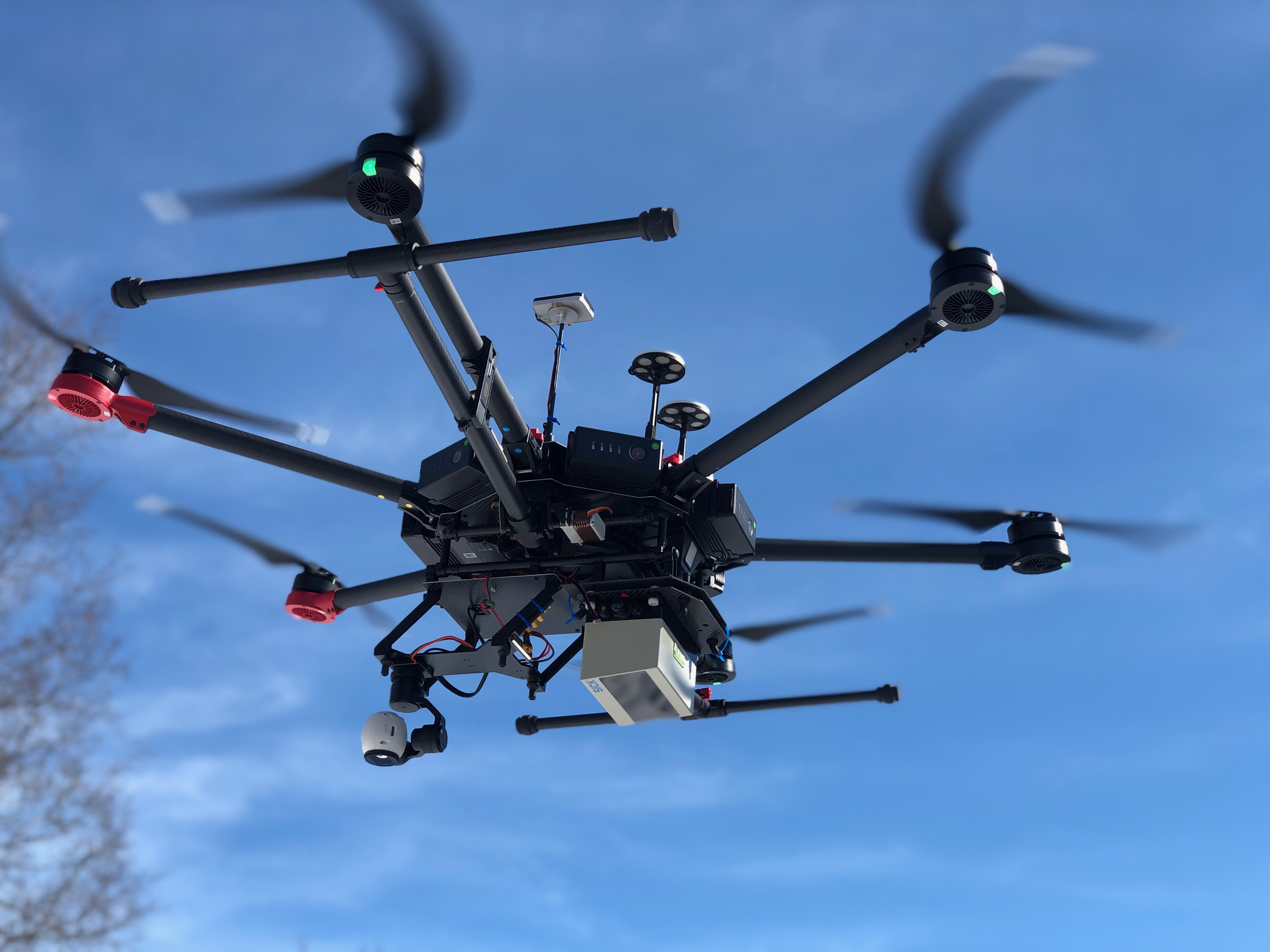 DJI M600 drone in flight with the LiDAR