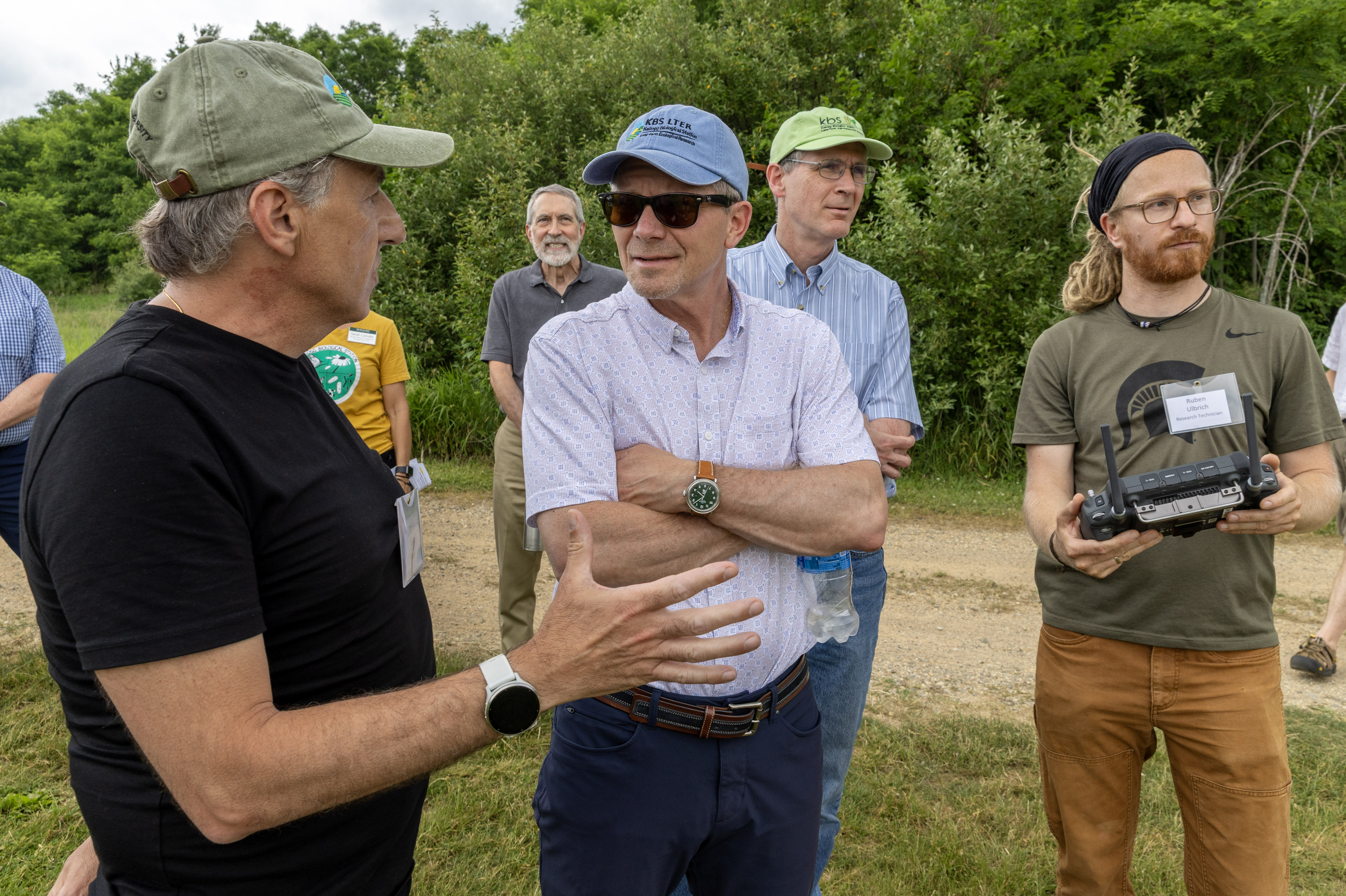 Bruno talks with MSU President Kevein Guzkiewicz